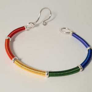Bracelet - "Don't Hide Your Pride" Colorful rainbow wire wrapped Sterling Silver bracelet.